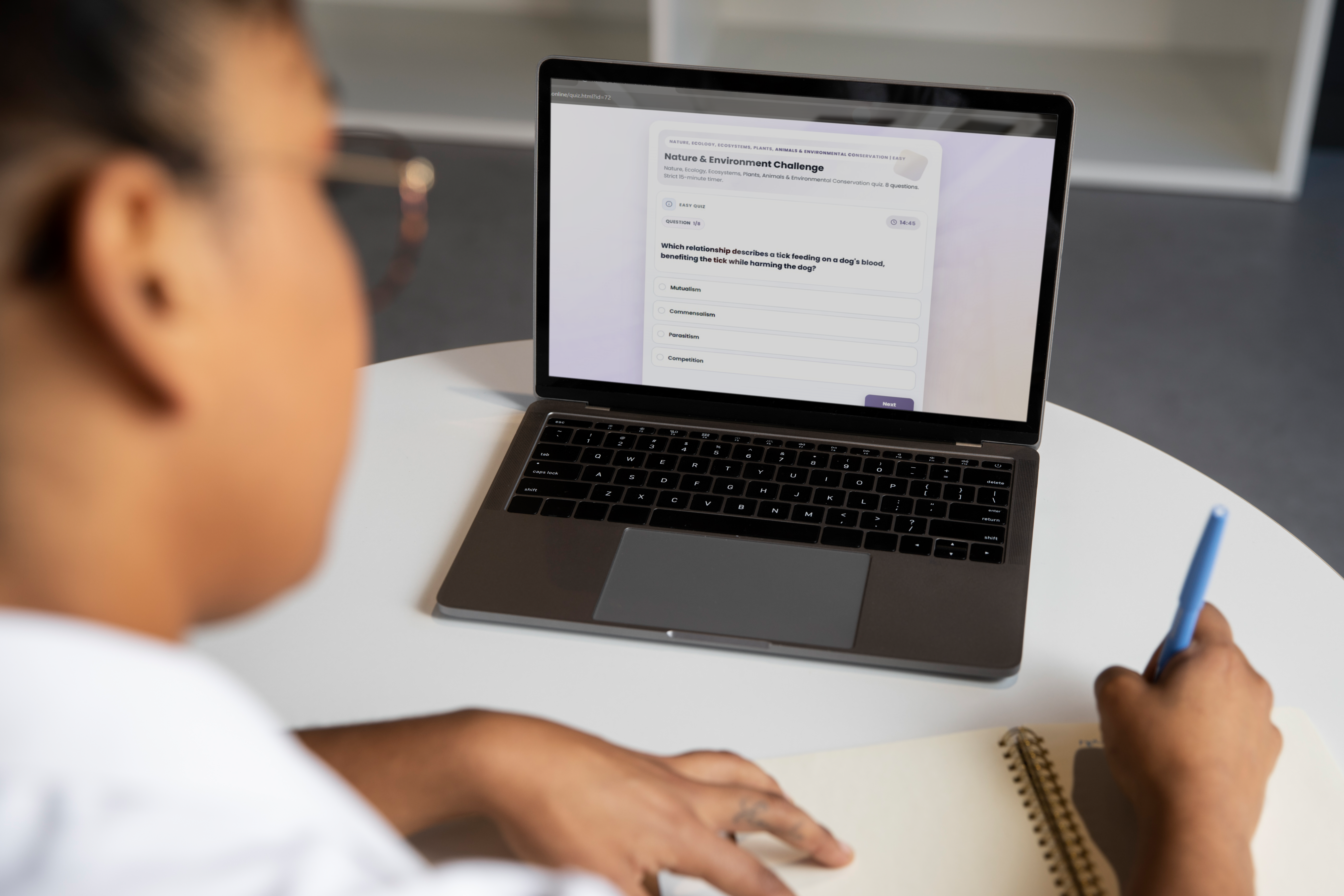 Student taking a Quizzora quiz on a laptop
